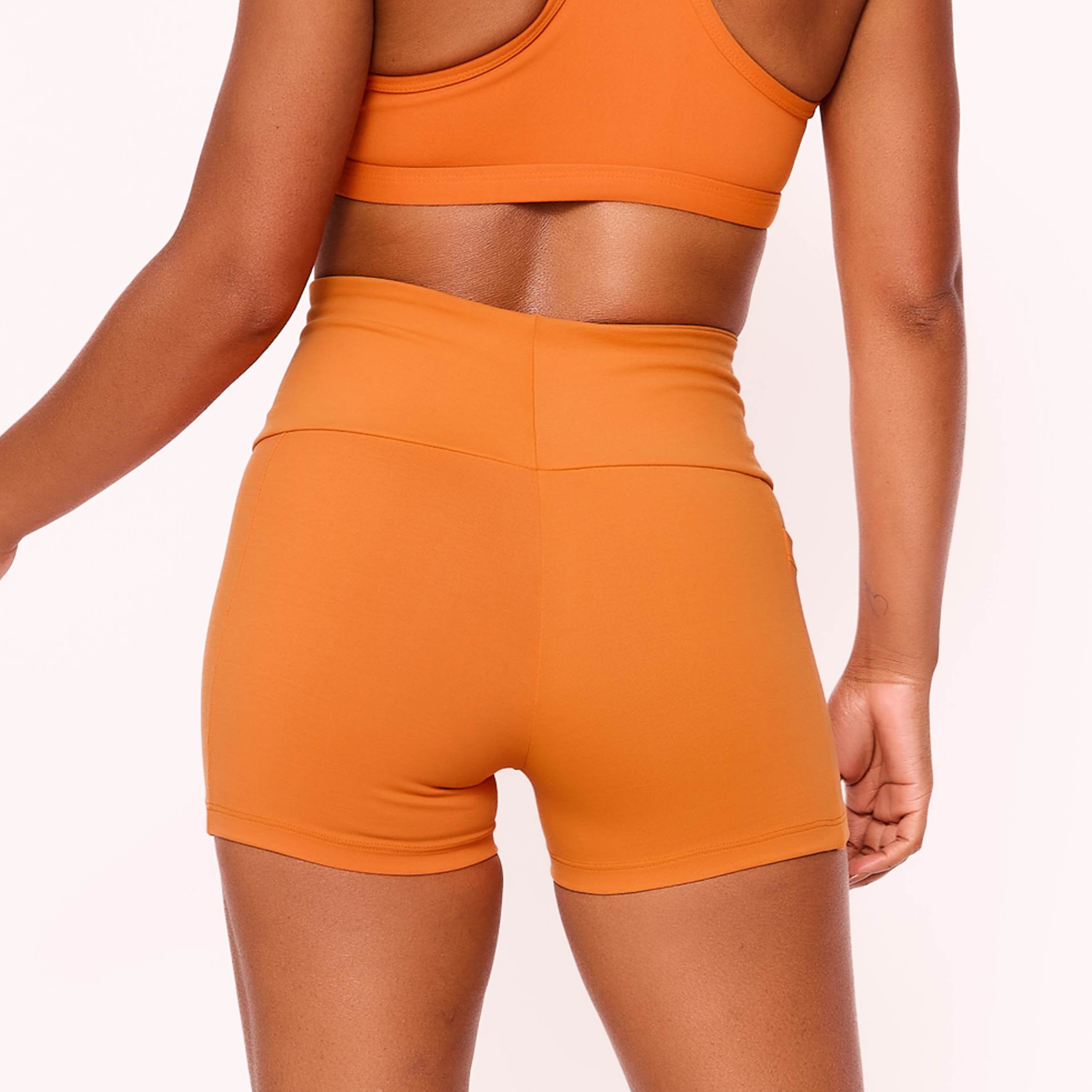 Short Fitness Compress Laranja